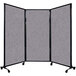 A Versare Cloud Gray Quick-Wall room divider screen on wheels.