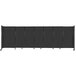 A black Versare StraightWall sliding room divider with wheels.