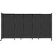 A Versare black StraightWall sliding room divider with wheels.