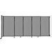 A Versare light gray wall-mounted room divider with black frame.