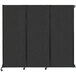 A black Versare wall-mounted folding room divider with three panels.