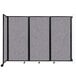 A Versare wall-mounted room divider in cloud gray with a black frame.