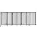 A clear poly Versare StraightWall wall-mounted room divider.