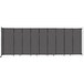 A charcoal grey Versare StraightWall wall-mounted room divider with black stripes.