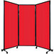 A red Versare Quick-Wall folding room divider with black trim.