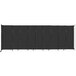 A black rectangular Versare StraightWall wall-mounted room divider with white trim.
