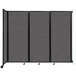 A Versare charcoal gray wall-mounted room divider with four panels.