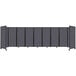 A dark gray rectangular Versare SoundSorb room divider with black trim.