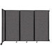 A Versare charcoal gray wall-mounted room divider with four panels.