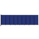 A blue wall-mounted room divider with black trim.