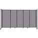 A Versare Cloud Gray StraightWall sliding room divider with black metal frame.