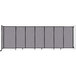 A Versare Cloud Gray wall-mounted room divider with wheels.