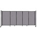 A Versare Cloud Gray StraightWall sliding room divider with a black metal frame.