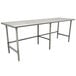An Advance Tabco stainless steel work table with metal legs.