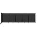 A black Versare wall-mounted room divider with 14' x 4' panels.