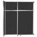 A black rectangular Versare sliding room divider with silver trim.