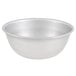 A silver Vollrath heavy duty stainless steel mixing bowl.