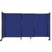 A Versare Royal Blue StraightWall sliding room divider with black trim on wheels.