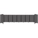 A long shot of a Versare charcoal gray foldable room divider.