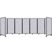 A marble gray Versare SoundSorb folding room divider with black trim.