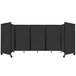A black rectangular Versare room divider with four panels.
