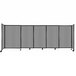 A light gray Versare StraightWall sliding room divider with black frames and wheels.