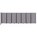 A grey Versare wall-mounted room divider screen with black trim.