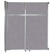 A grey fabric panel for a Versare sliding room divider with silver metal frames.