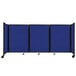 A Versare Royal Blue foldable room divider on wheels.