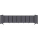A long row of dark gray Versare SoundSorb room dividers.