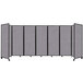 A Versare Cloud Gray room divider with black trim on the panels.