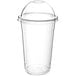 A clear plastic Choice 20 oz. plastic cup with a dome lid.