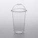 A clear plastic Choice cold cup with a dome lid.