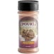 A bottle of UPOURIA Chocolate Shakeable Coffee Topping with chocolate powder inside.