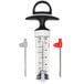 An OXO marinade injector bottle with metal and plastic parts.