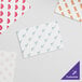 A pack of white SatinWrap tissue paper sheets.