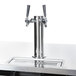 A metal tap on a counter.