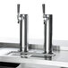 A stainless steel Beverage-Air kegerator with two taps.