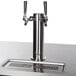 A black Beverage-Air kegerator with a stainless steel double and triple wine tap.
