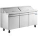 An Avantco stainless steel three door sandwich and salad prep table.