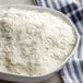 a bowl of flakes in a white bowl