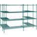 A green metal wire shelving unit with four shelves.