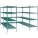 A green metal shelving unit with four tiers.