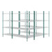 A white wire shelving unit with green metal rods and drop mat shelves.