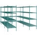 A green metal Regency wire shelving unit with four shelves.