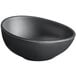 A dark gray round matte melamine ramekin.