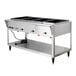 A stainless steel electric four-pan hot food table with a lower shelf and control knobs.