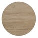 A 30-inch round reversible table top with a white birch and ash laminated finish.