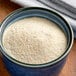 A bowl of Goya ham flavor powder.