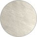 A close-up of a white round Lancaster Table & Seating table top with a few marks.